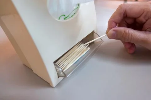 Tissue box with toothpick with hand Stock Photos