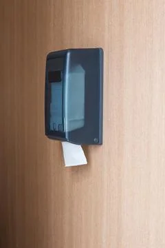 Tissue box on the wall in the bathroom Stock Photos