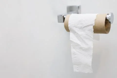 Tissue, Close up of a man hand using detail of one single clean toilet pape.. Stock Photos