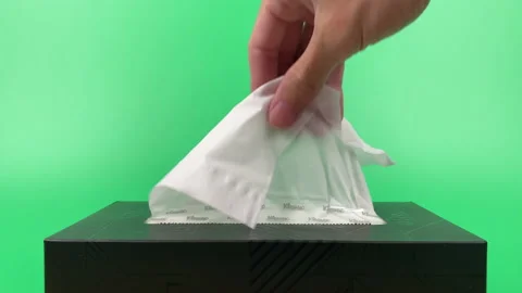 Tissue paper in tissue paper box isolated on green background. Stock Footage 201348923