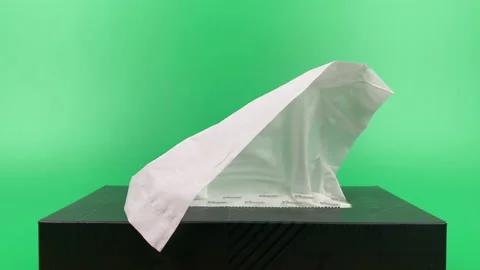 Tissue paper in tissue paper box isolated on green background. Stock Footage 201348948