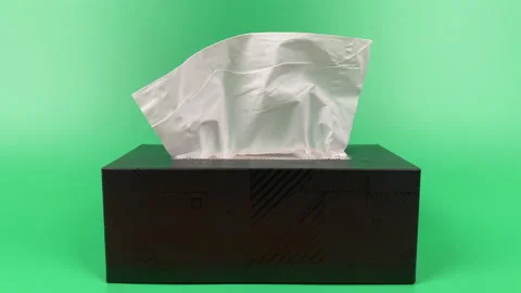 Tissue paper in tissue paper box isolated on green background. Stock Footage 201349177