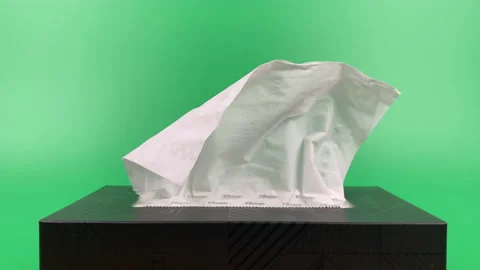 Tissue paper in tissue paper box isolated on green background. Stock Footage 201349255