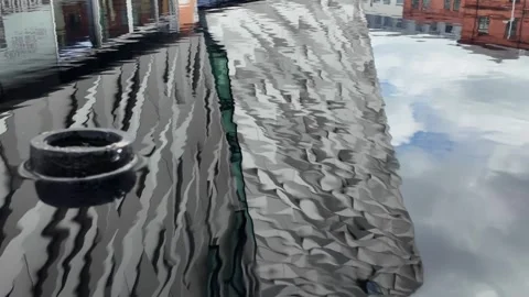 Titanic Belfast - Architectural Reflection in the Titanic Quarter Water Basin Video stock 338222445