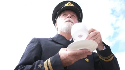 Titanic Ship's Captain drinking tea in u... | Stock Video | Pond5