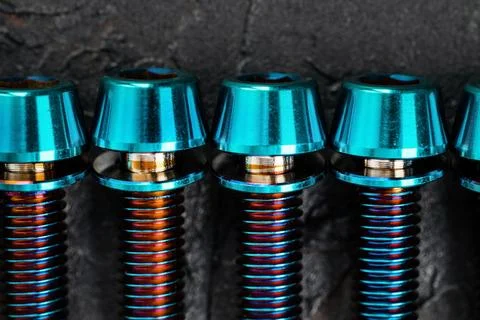 Titanium bicycle bots on a black textured background Foto stock