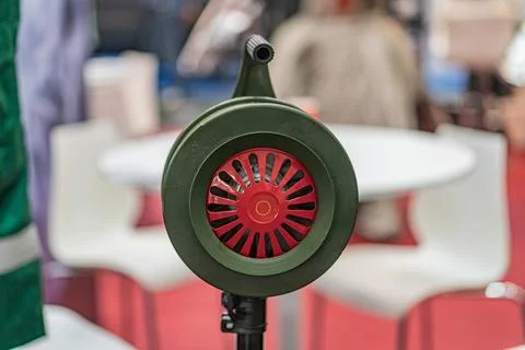 Titanium dentures on a 3D printer, green casing, red fan-like device, black b Stock Photos