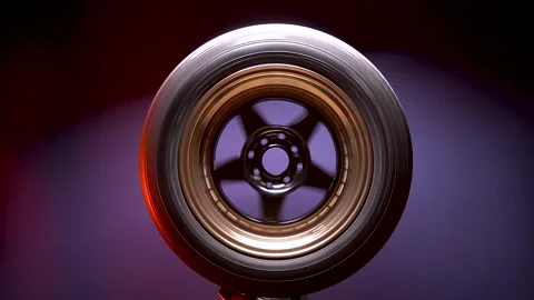Titanium rims in black and bronze color with fifteen radius 動画素材 258656060