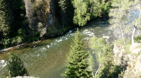 Title: 4k – Big wild river in grotto 01 Stock Footage 53282107