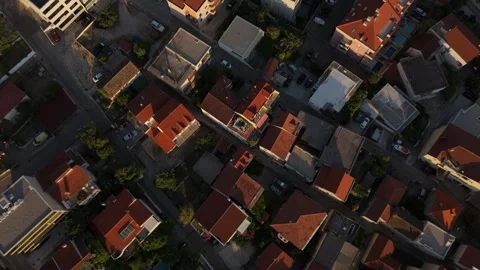 Title: Aerial Top-Down Drone Flight Over Makarska City at Golden Hour, Croatia Stock Footage 320145923