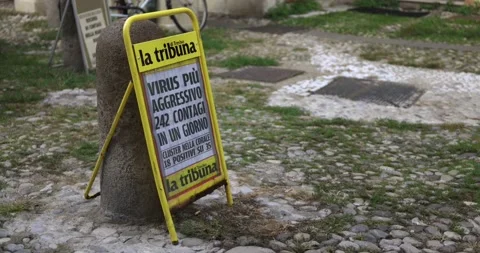 Title of an article in local newspaper Tribuna di Treviso about new infections Stock Footage 150393069