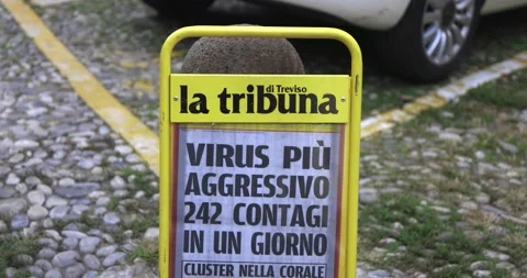 Title of an article in local newspaper Tribuna di Treviso about new infections Stock Footage 150393073