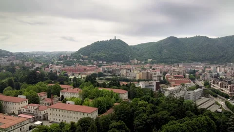 Title Drone flight towards Como City - Baradello Tower and mountain landscape Stockbeeldmateriaal 325792565