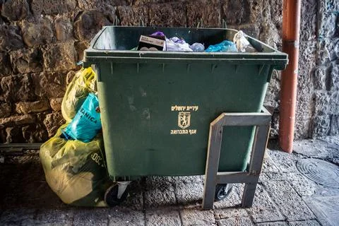 Title: Public Trash Cans and Waste Containers in the Streets of Jerusalem. Stock-Fotos