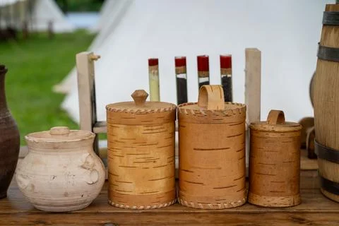 Title: Rustic Birch Bark Containers on Wooden Table Display Stock Photos
