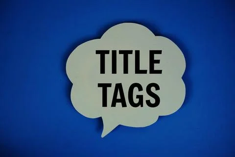 Title Tags text with speech bubble on blue background Stock Photos