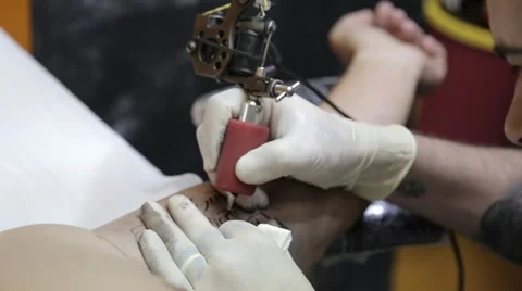 Title tattoo on arm Stock Footage 61742148