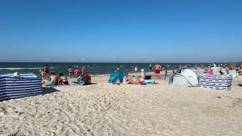 Title Vacation at the Beach in Łeba, Sunny Day by the Baltic Sea Stock Footage 281906019