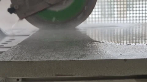 Title: Wet Tile Saw Starting to Cut Ceramic Floor Tile Stock-Footage 336266860