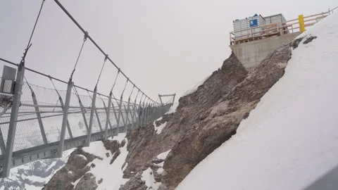The Titlis Cliff Walk, Mount Titlis in the Swiss Alps Stock Footage 310707750