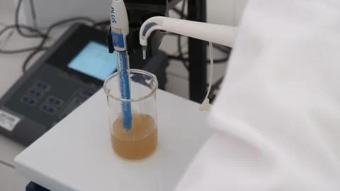 Titration of the solution, experiment in the laboratory Stock Photos