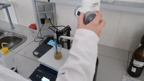 Titration of the solution, experiment in the laboratory Stock Photos