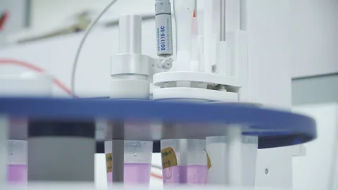 TITRATOR Machine working Laboratory Pink solution Close up 50fps Stock-Footage 247494633