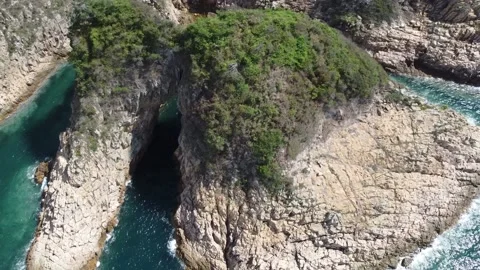 Tiu Chung Chau flying down to the arch Stock Footage 169125491