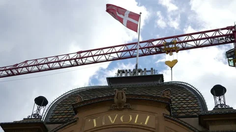 Tivoli main entry with flag and crane in Copenhagen Stock Footage 65007459