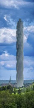 The TK-Elevator test tower in Rottweil next to a church tower. The 246 metre Stockfoto's
