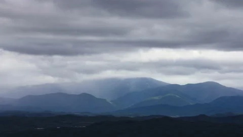 T/L Beautiful clouds moving over the mountain in asia Stock Footage 162602245
