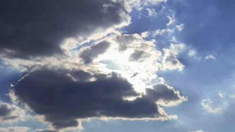 T/L Beautiful cloudscape with large building clouds at the sun Stock Footage 162589753