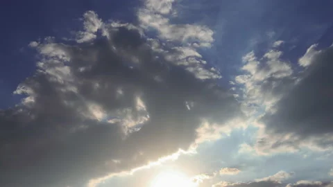 T/L Beautiful cloudscape of sunset breaking through cloud mass Stock Footage 162589851