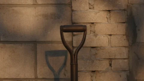 T/L Beautiful shadow change at evening with shovel shot in time lapse Stock Footage 162595475