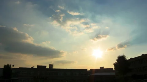T/L Beautiful sunset over the school building in asia Stock Footage 162598809