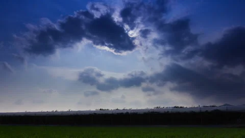 T/L Clouds moving over the greenhouse Stock Footage 162592840