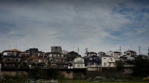 T/L Clouds moving over houses in Yamato, Kanagawa Prefecture Stock Footage 40696231