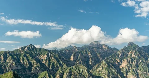 T/L Clouds OVer Mountains Stock Footage 103506885