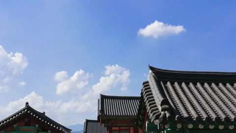 T/L ED Peaceful clouds passing over the roof of traditional Korean hanok Stock Footage 164009215