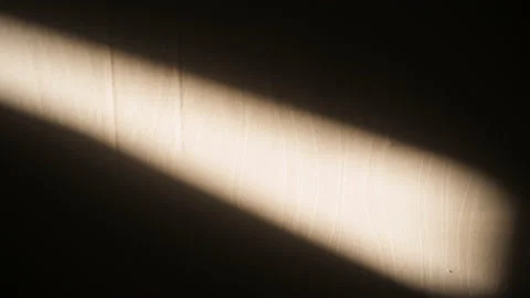 T/L Entering window light with changing ray on the wall Stock Footage 162596030