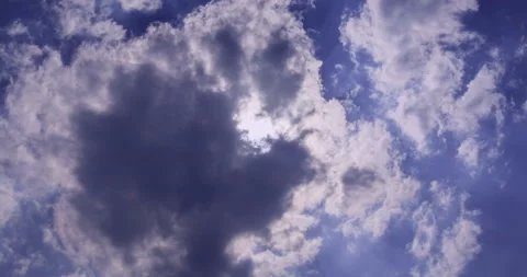 T/L Fast moving sun over the clouds Stock Footage 162588043