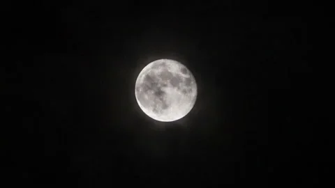 T/L HD Move the moon across light clouds over the sky Stock Footage 162591105