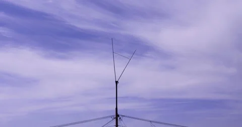 T/L Lightning rod at the sky of light clouds moving Stock Footage 162591885