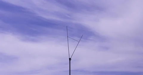 T/L Lightning rod at the sky of light clouds moving in zoom Stock Footage 162591973