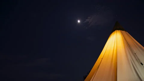 T/L Moving the cloud above tent at the moon in time lapse Stock Footage 162605807