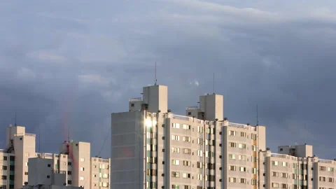 T/L Moving clouds over the apartment in a rain Stock Footage 162603604