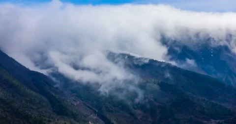 T/L shot of Cloud waterfall in Western Sichuan/Sichuan,China Stock Footage 97237950