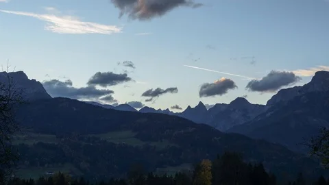 TL timelapse clouds over dark mountains of the Hagengebirge at sunset Stock-Footage 99310147