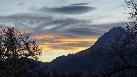 TL timelapse clouds at sunset at the Hochkoenig Salzburg Stock-Footage 99437008