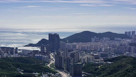T/L View of Hwangnyeongsan mountain, cloudscape and cityscape of Busan Stock Footage 164012146